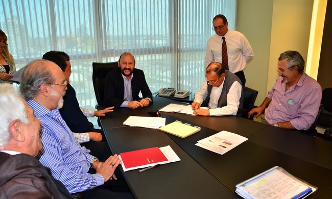 Amadeo Nicora en reunión con Insfrán en Casa de Gobierno.