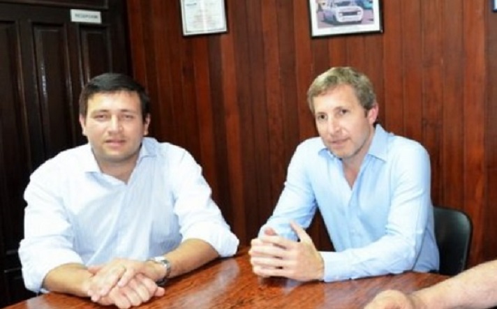 El doctor Peña, junto al actual ministro del Interior Rogelio Frigerio durante la visita de este en el año 2013.