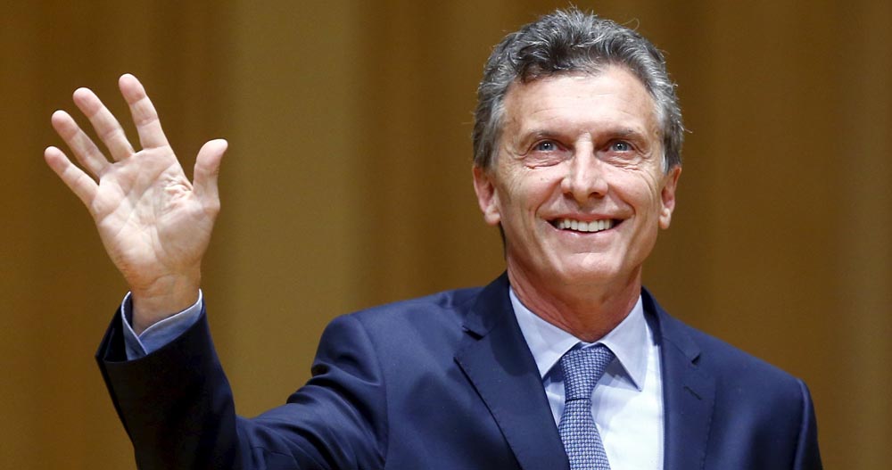 Argentina's President-elect Mauricio Macri acknowledges the audience as he attends the inauguration of incoming Buenos Aires' City Mayor Horacio Rodriguez Larreta (not seen) in Buenos Aires December 9, 2015. Macri's victory in a run-off last month turned Argentine politics on its head, ending 12 years of leftist populism under outgoing President Cristina Fernandez de Kirchner and her late husband and predecessor, Nestor Kirchner. Macri promises to remove state controls on the ailing economy and conduct more orthodox policies.REUTERS/Enrique Marcarian